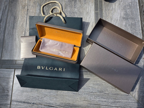 Bvlgari gold clamshell - bvlgari,
